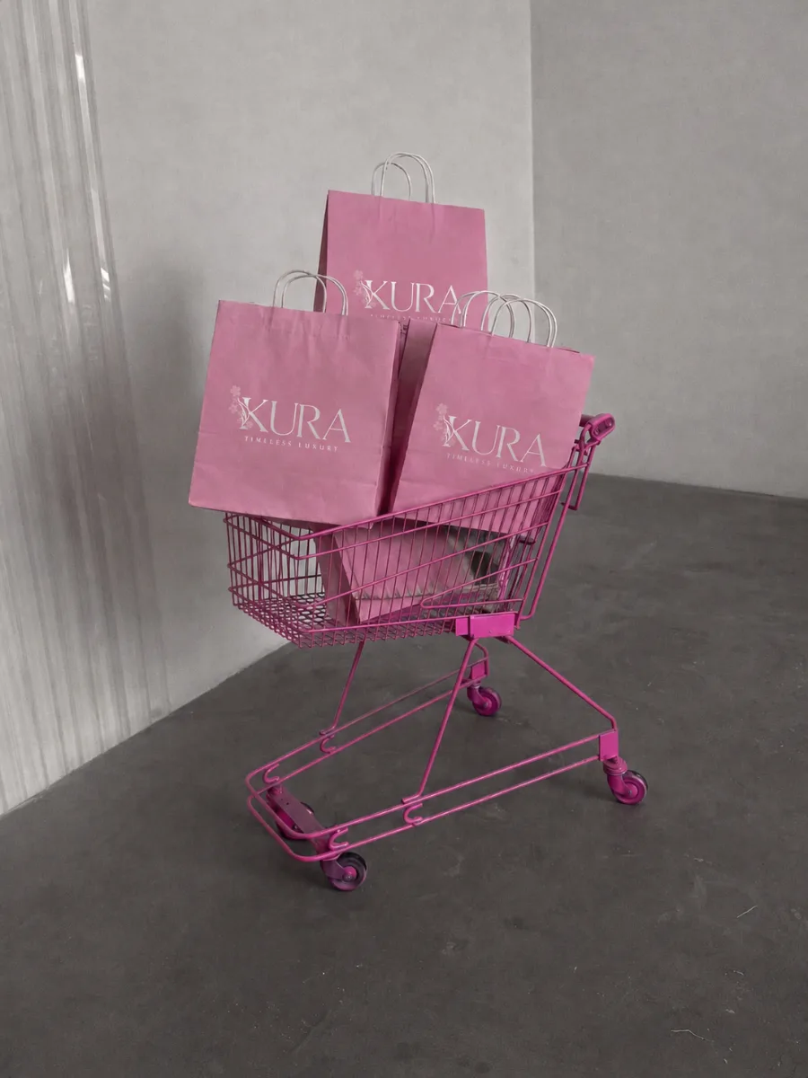 Carrito rosa con bolsas KURA